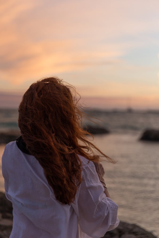 Girl Back Watching The Caribbean Beach